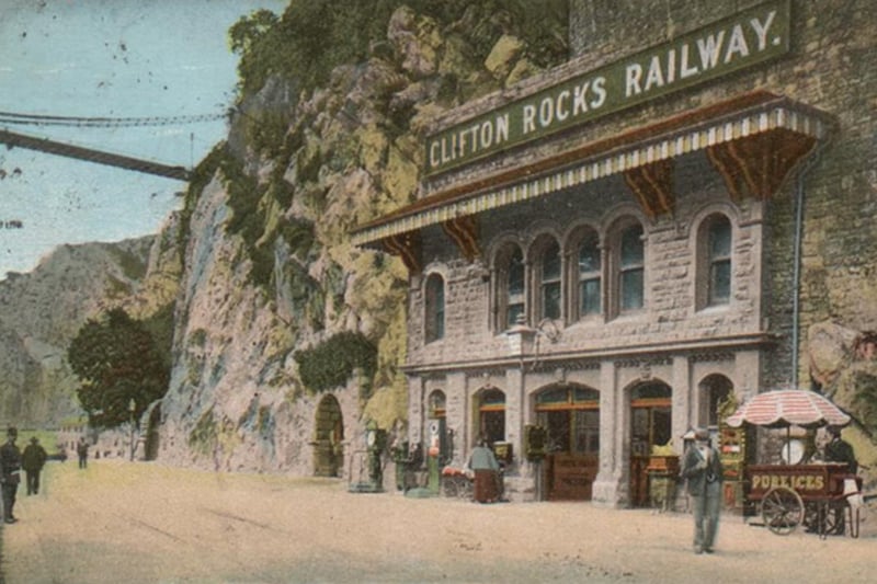 The lower station was constructed inside the rock with a beautiful facade created at its front. The six windows at mid-level provided a perfect view of the river with a timber canopy above them provided shade. In this street scene you can see public ices being sold outside.