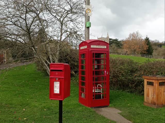 Traditional letter box, yes. Traditional phone box, now a library, yes. Compton Dando has the charm of any traditional countryside village.
