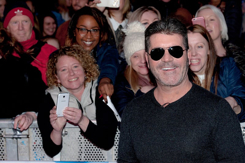 Simon Cowell with fans as he arrives for the Birmingham audtions for Britain’s Got Talent at Birmingham Hippodrome on February 4, 2016 in Birmingham, England.  (Photo by Richard Stonehouse/Getty Images)