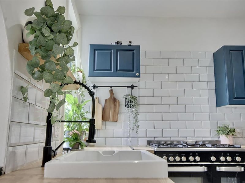 The kitchen has plenty of storage space