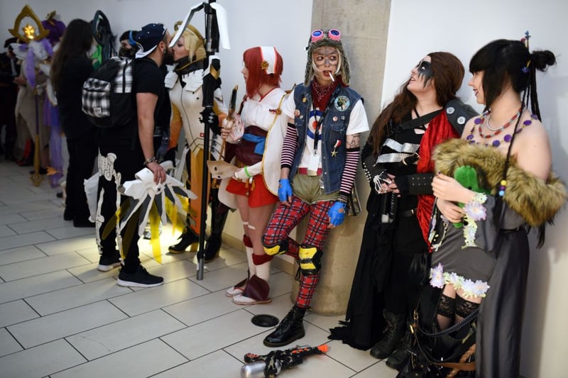 Cosplayers queue for the Masquerade competition at the MCM Comic Con 2017. (Photo: OLI SCARFF/AFP via Getty Images)