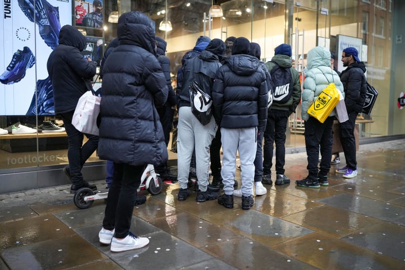People queue outside Footlocker on Market Street for newly released trainers. (Photo by Christopher Furlong/Getty Images)
