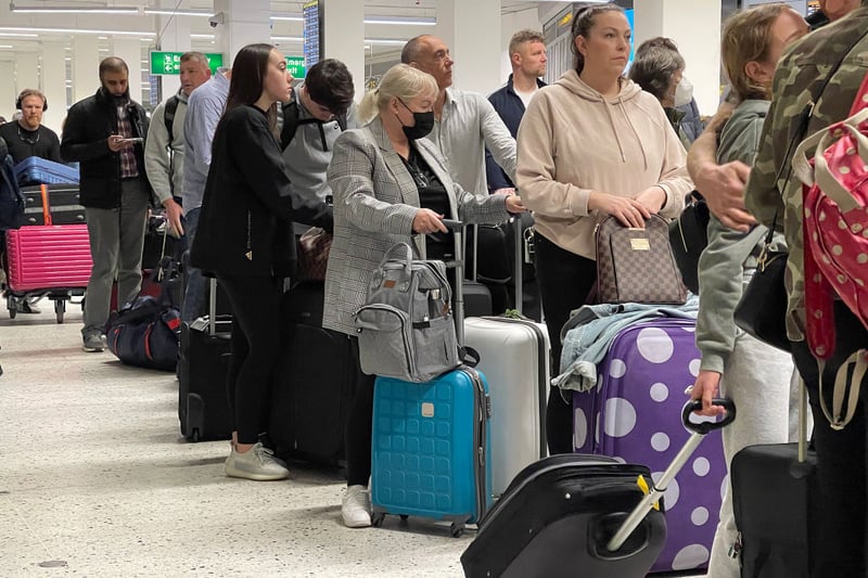 A combination of high passenger volumes and staff shortages led to chaos at Manchester airport last year. At its height, passengers were queuing outside the building, with many people complaining about missed flights. (Photo by Christopher Furlong/Getty Images)