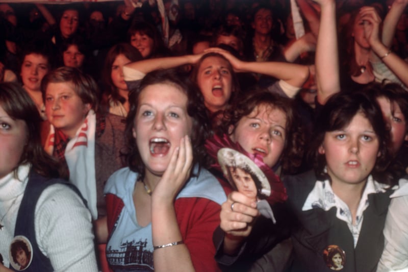 Thousands of adoring David Essex fans lose control during one of his concerts at the Belle Vue in Manchester. Credit: Getty