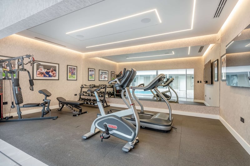 The house also has a dedicated gym space, perfect for any potential Premier League buyers. The current occupant seems to have a penchant for the sport too with stars hung on the walls.