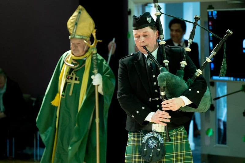 St Patrick (aka Len) and an Irish piper lead the celebrations for the 49th Birmingham St Patrick’s Parade in 2023 in Cannon Hill Park (Photo - Chris Egan)