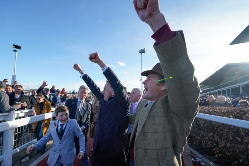 Trainer Henry de Bromhead (C) celebrates after Rachael Blackmore rides Honeysuckle to win The Close Brothers Mares’ Hurdle during day one of the Cheltenham Festival 2023 at Cheltenham Racecourse on March 14, 2023 in Cheltenham, England. (Photo by Alan Crowhurst/Getty Images)