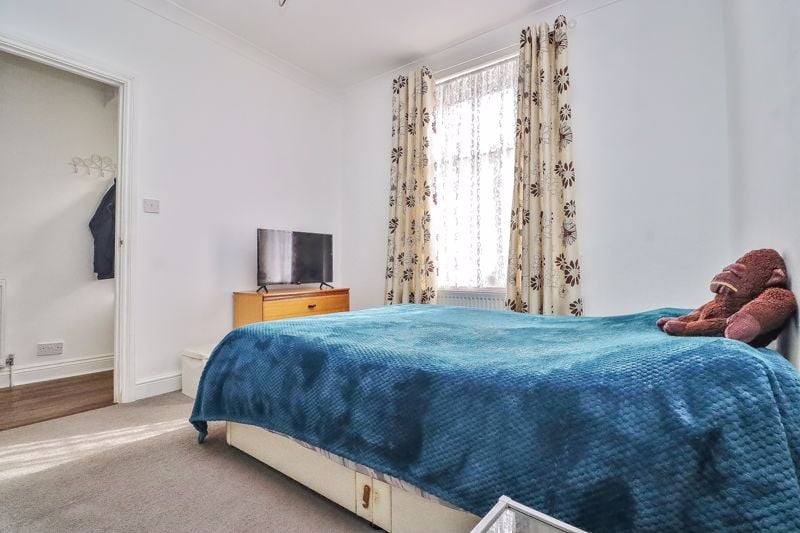One of the reception rooms is currently being used as a bedroom