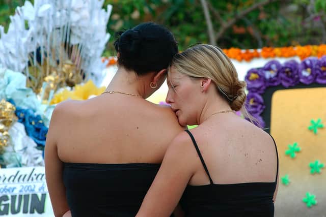 A memorial service for those killed in the Bali bombings on October 12, 2002 (Photo: Edy Purnomo/Getty Images)