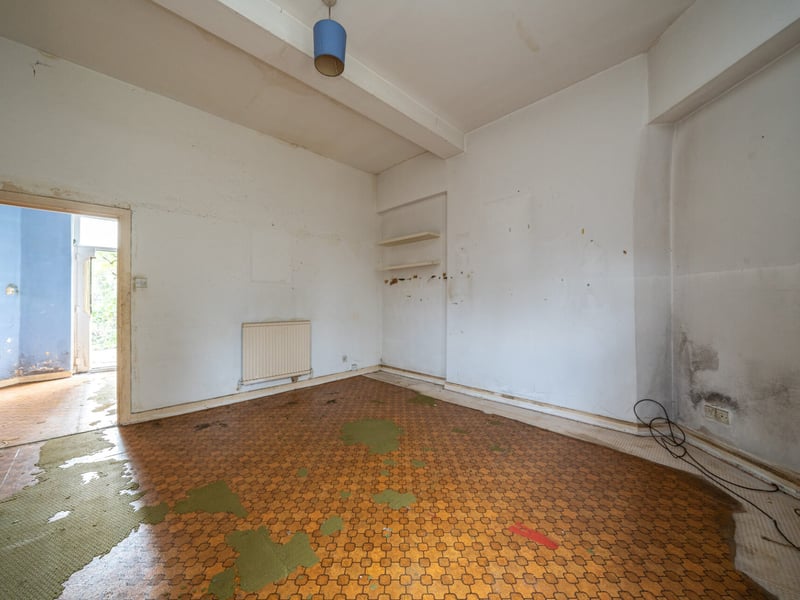 The living room is in need of some renovation