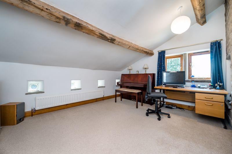 The space can be used as an office, or even a piano room.