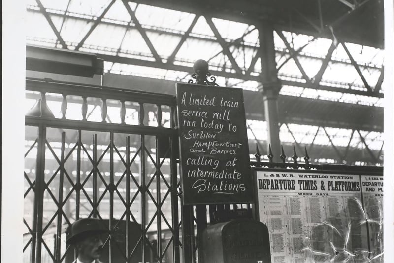 A noticeboard at a London station announces a limited service to Surbiton, Hampton Court and Barnes during the Great Railway Strike, September 1919. (Photo by Hulton Archive/Getty Images)