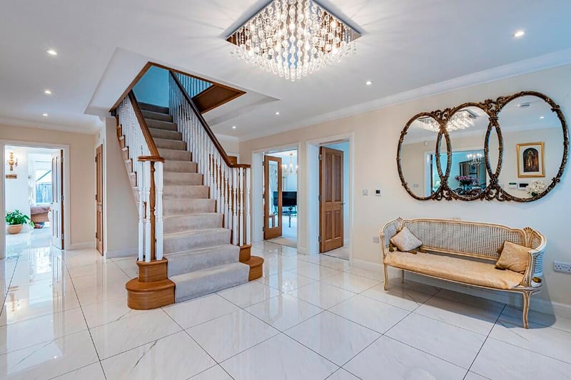 Entrance hallway with its centrepiece staircase.