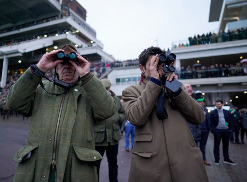 Watching the action during day three of the Cheltenham Festival 2023 at Cheltenham Racecourse on March 16, 2023 in Cheltenham, England. (Photo by Alan Crowhurst/Getty Images)