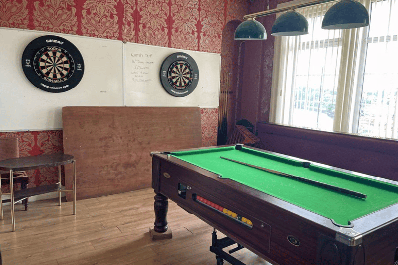 Two dart boards and a pool table, staples of any pub!