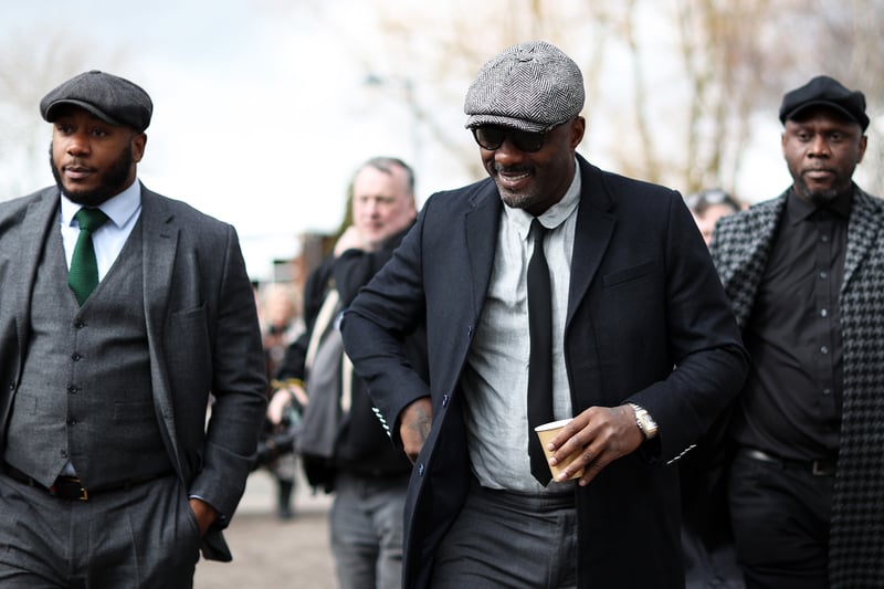 Actor and DJ Idris Elba arrives with friends for the big day