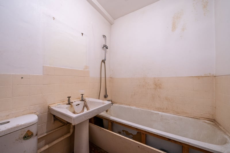Any potential buyers will have to renovate much of the house including the bathroom 