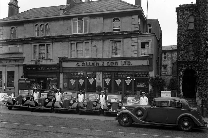 Staff line up outside the car dealer, where Alvis, Singer, Standard and Triumph vehicles could be purchased. The firm also had premises in Gloucester Road and Berkeley Square. It dissolved in 1979.