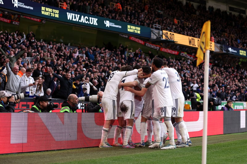 Leeds stars celebrate the side’s third goal as they climbed out the relegation zone on Saturday.