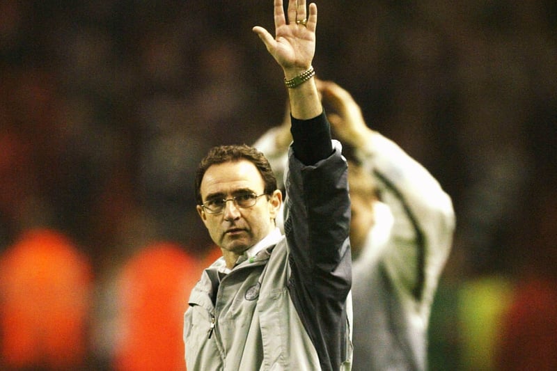 Manager Martin O’Neill celebrates their famous triumph at Anfield in front of 3,000 travelling Celtic fans who made the trip south of the border after masterminding another remarkable result
