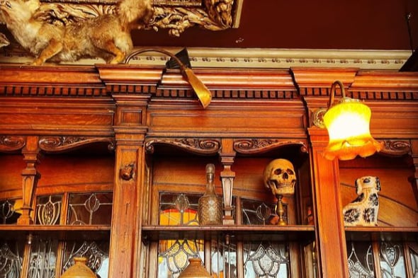 Taxidermy and a skull feature in the design.