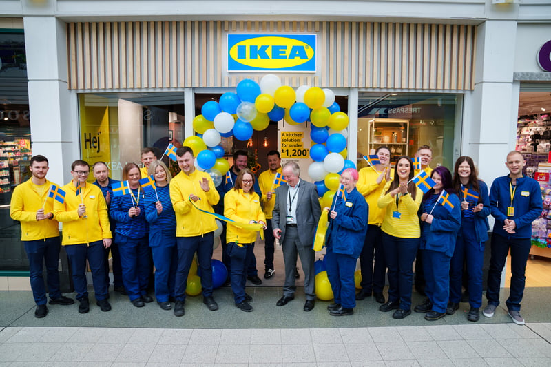 Staff celebrate the new IKEA Stockport store opening on its first day with local leaders