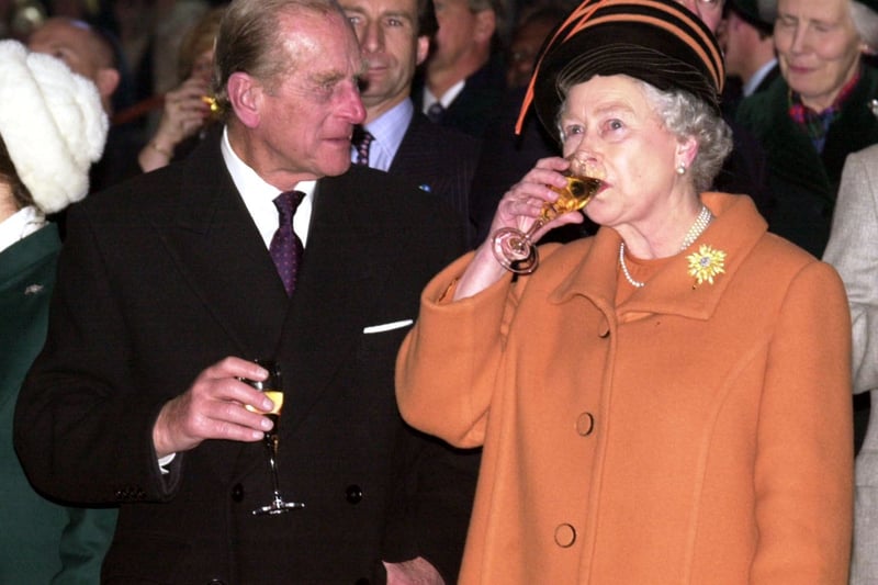 On December 31, 1999 the Duke of Edinburgh and Queen Elizabeth II toasted the new millennium at the dome.  (Photo by Arthur Edwards/AFP via Getty Images)