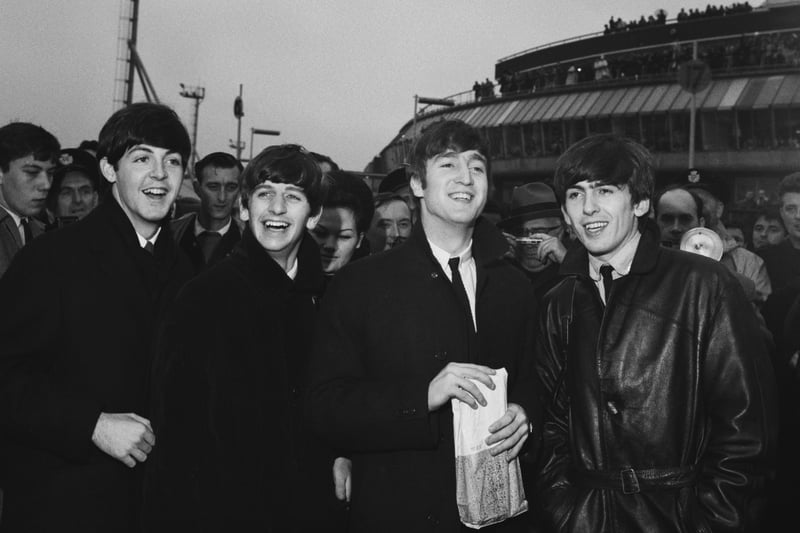 The boys arrive in London after a tour of Sweden in October 1963.