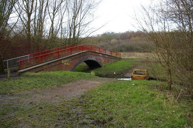 Woodgate Valley Country Park is a 450 acre area of countryside in the centre of Bartley Green and Quinton. There are many mixed, mature hedgerows, meadows, and woodland through which you can walk your puppy. (Photo - Phil Champion / Footbridge and ford across the Bourn Brook, Woodgate Valley Country Park / CC BY-SA 2.0)
