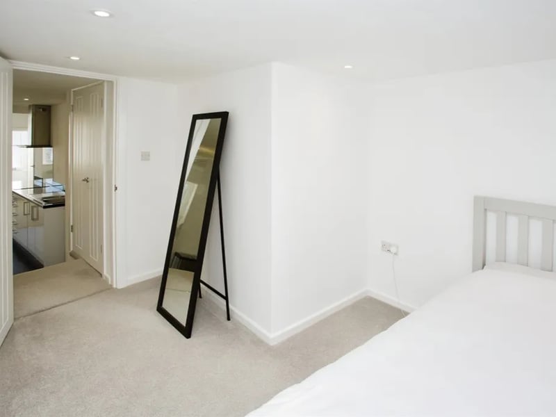 Another view of the bedroom leading to the landing area