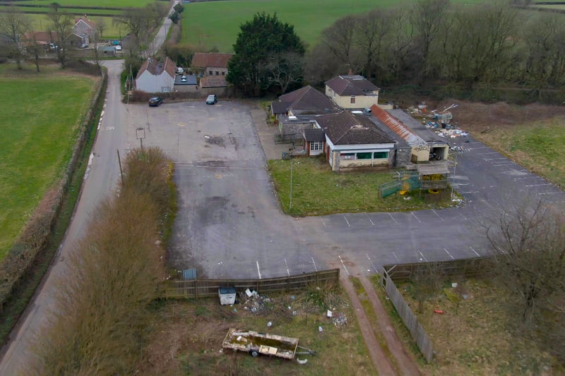 A drone shot showing the pub while approaching from Kingsdown Road.