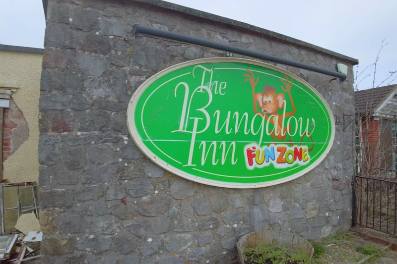 A sign greets visitors before they enter the premises. 