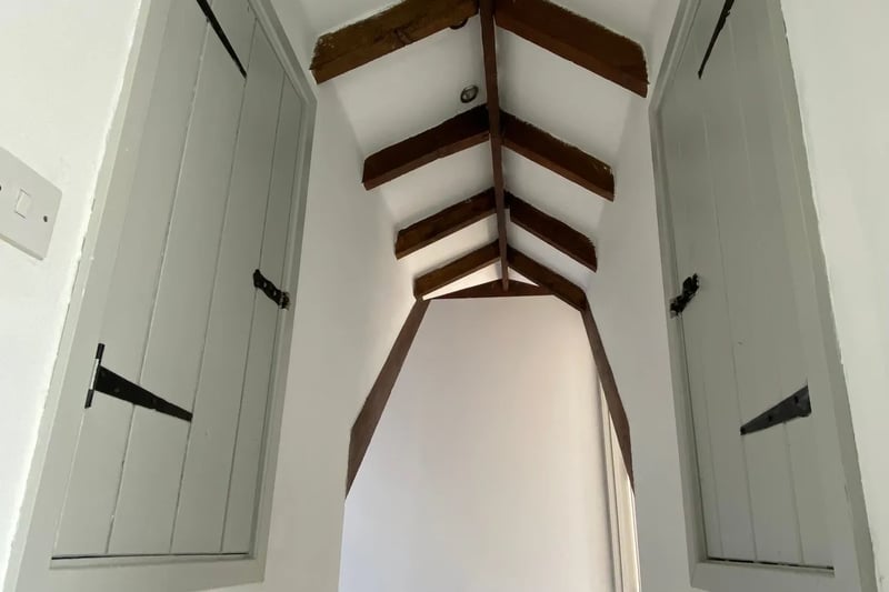 The property features slanted attic ceilings 