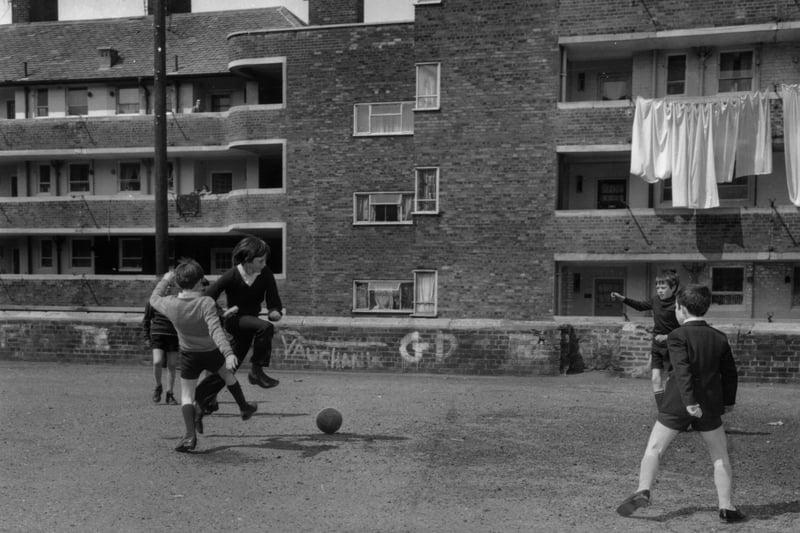 A group of children playing football in Juvenal Gardens, Liverpool