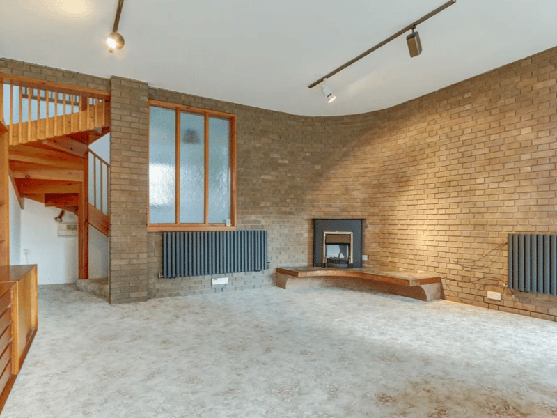 Another view of this room, complete with a vintage fireplace