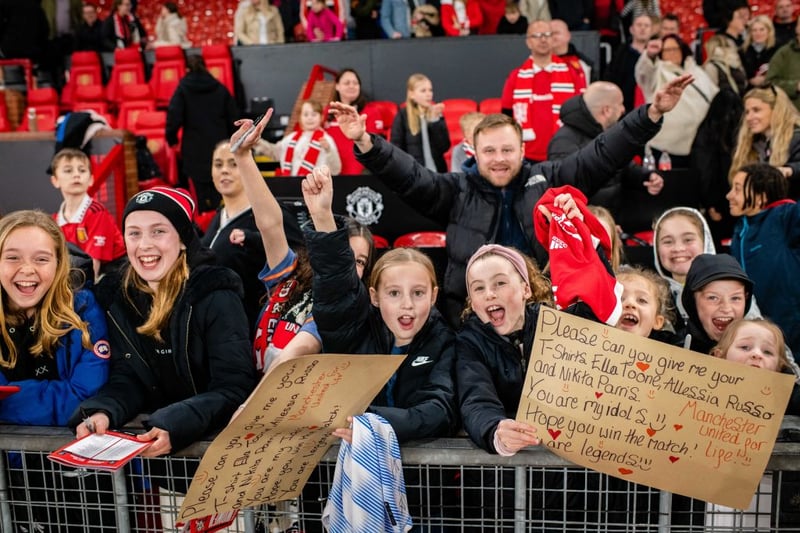 Young fans share signs showing love for their Man Utd heroes.