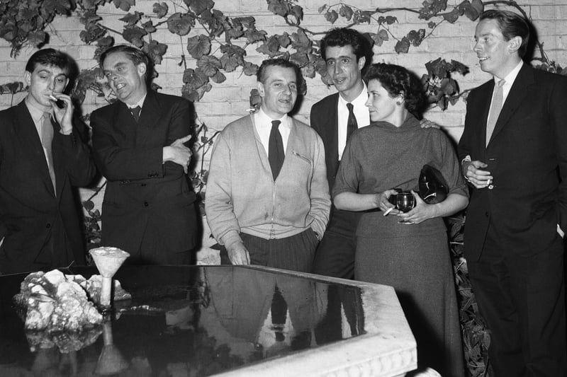 Left to right: Bill Hopkins, John Wain, British film and theatre director Lindsay Anderson, Tom Maschler, Doris Lessing and Kenneth Tynan at a party to celebrate the publishing of Declaration on October 14, 1957. (Photo Mirrorpix/Omnibus)