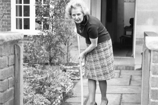 Margaret Thatcher on February 2, 1975, who was challenging for the Conservative party leadership at the time. She is pictured sweeping the yard at her Chelsea home. (Photo Mirrorpix/Omnibus)