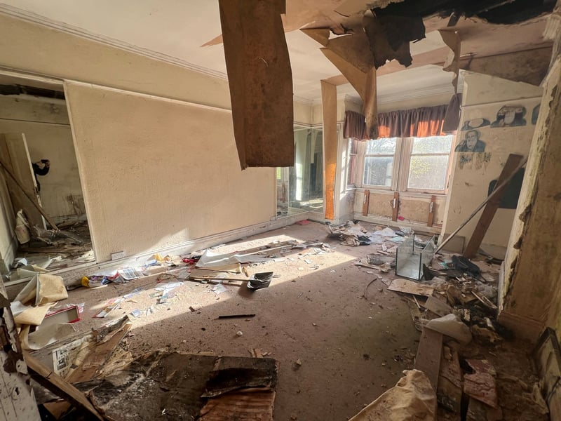 Another room with old furniture in it
