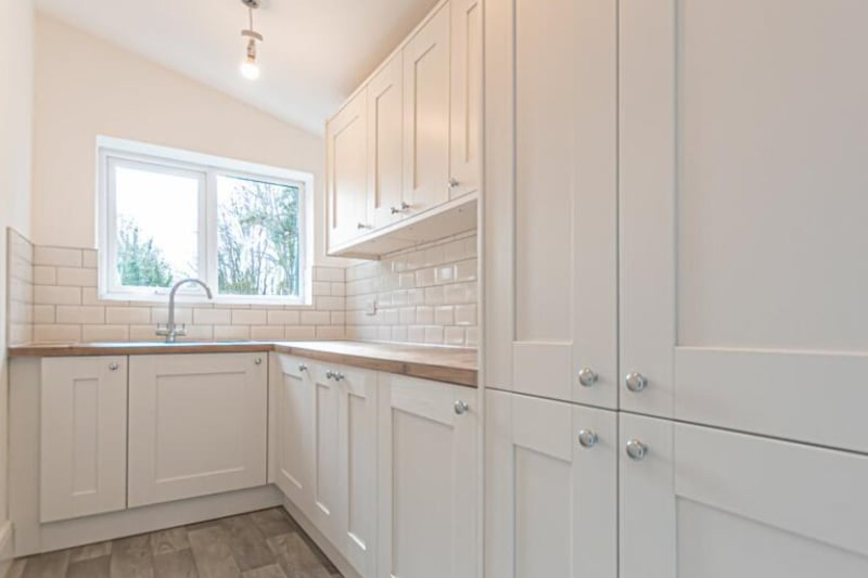 As well as five bedrooms, two bathrooms, reception rooms and a kitchen/diner, the property has a utility room.