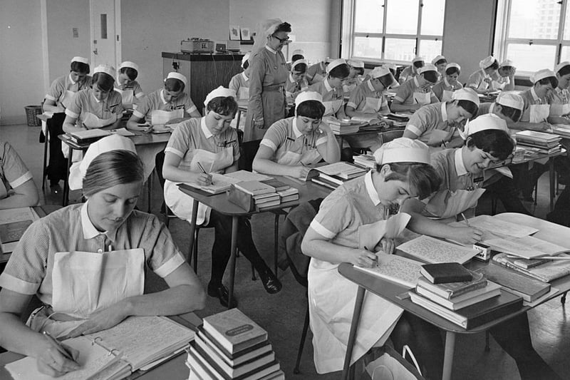 March 1 1968:  Student nurses working during a class at the School of Nursing, St Bartholomew’s Hospital, London.  (Photo by Fox Photos/Getty Images)