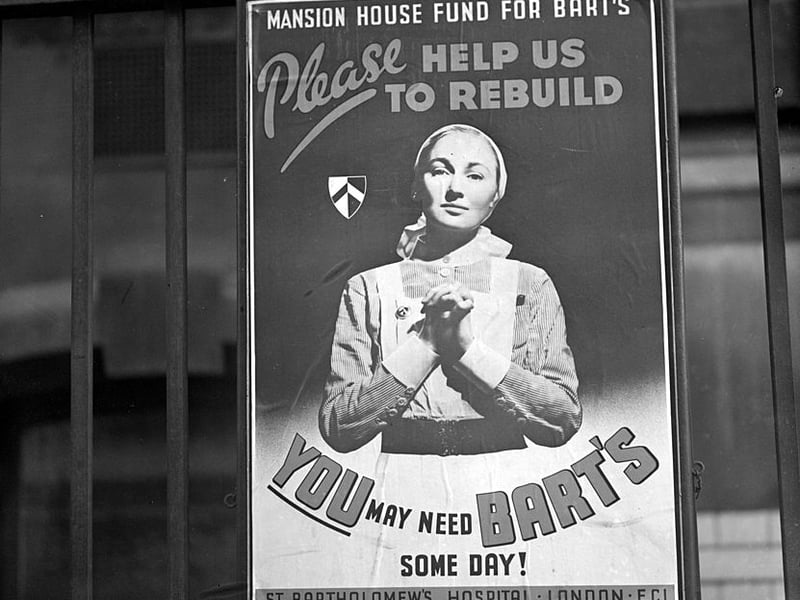 1939: A poster exhorting the public to give money to the Mansion House Fund for the rebuilding of St Bartholomew's Hospital, London. (Photo by London Express/Getty Images)