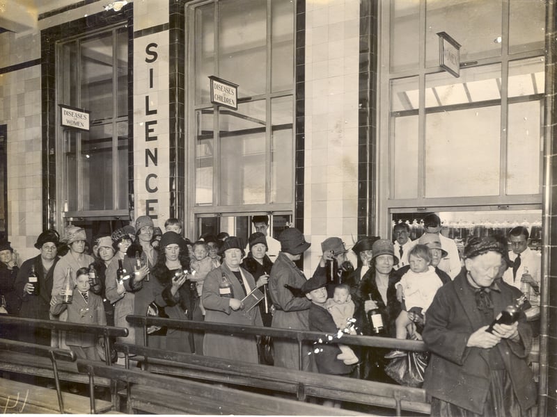  Reception desk and patients waiting in Outpatients hall, St Bartholomew's Hospital, c1929