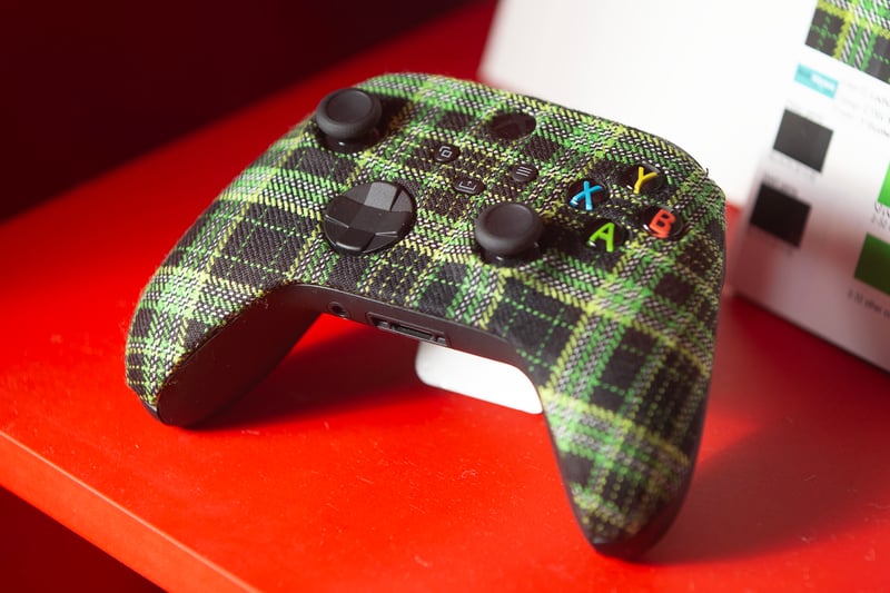 One of the newest exhibits is a tartan-covered Xbox Wireless Controller from 2022. The Xbox tartan was created to celebrate the 20th anniversary of Xbox in Scotland in partnership with Gordon Nicolson Kiltmakers, and weavers Lochcarron of Scotland Est 1892. 