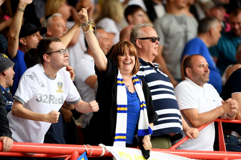 A Leeds United fan celebrates the opening goal  during the Sky Bet Championship match between Bristol City and Leeds United at Ashton Gate on August 04, 2019
