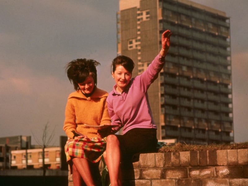 Not even the Gorbals were safe from the widespread Beatles bug - two fans pose for a picture in the 60s.