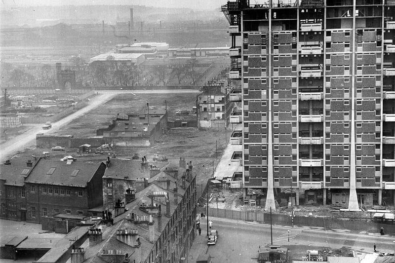  Modern housing under construction beside old tenements in the Gorbals area of Glasgow. (Photo by Albert McCabe/Express/Getty Images)
