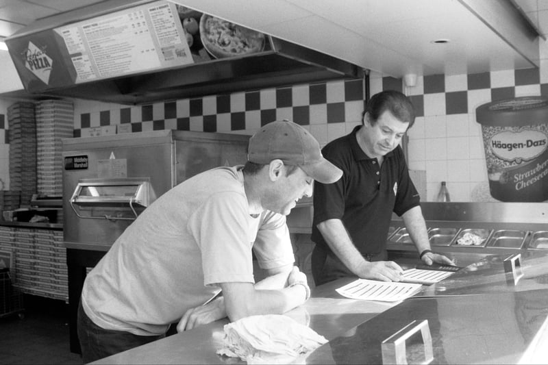 Perfect Pizza takeaway shop, Halifax Road 17/08/2004,  Owner Pelayias Petrov and assistant Zabeer Aslam