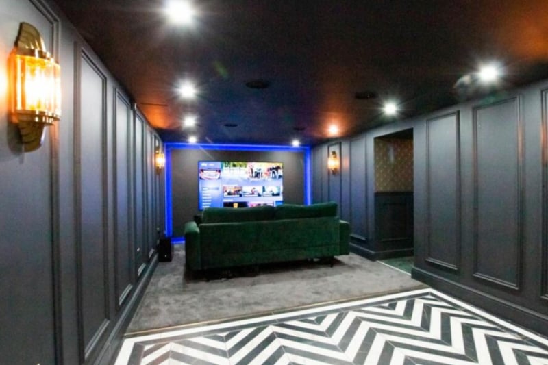 The cellar has been converted into an incredible space, with a home cinema!