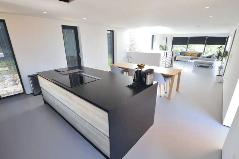 What appears to be the kitchen - with a smooth matte surface